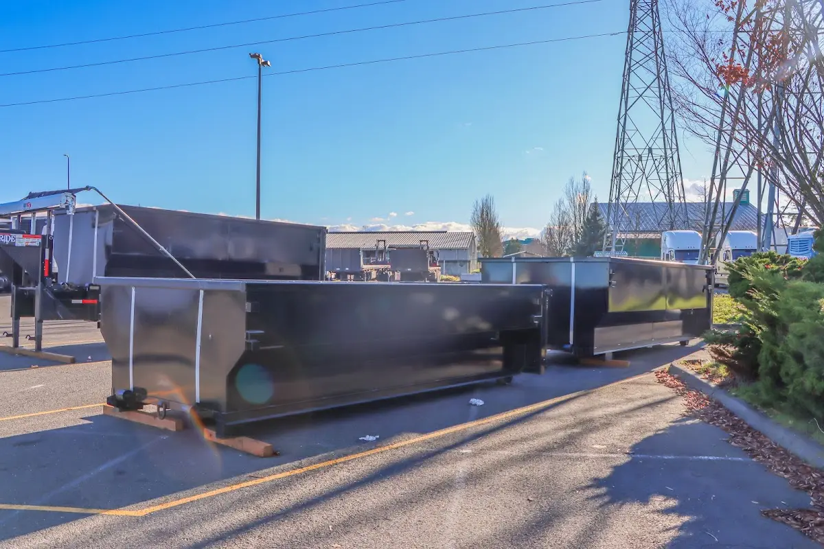 Roll-off dumpster ready for waste disposal at job site for 3 Yard Dumpster Rental in Andover